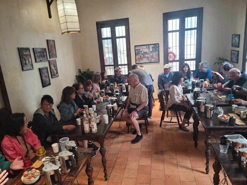 a group of people sitting at a table