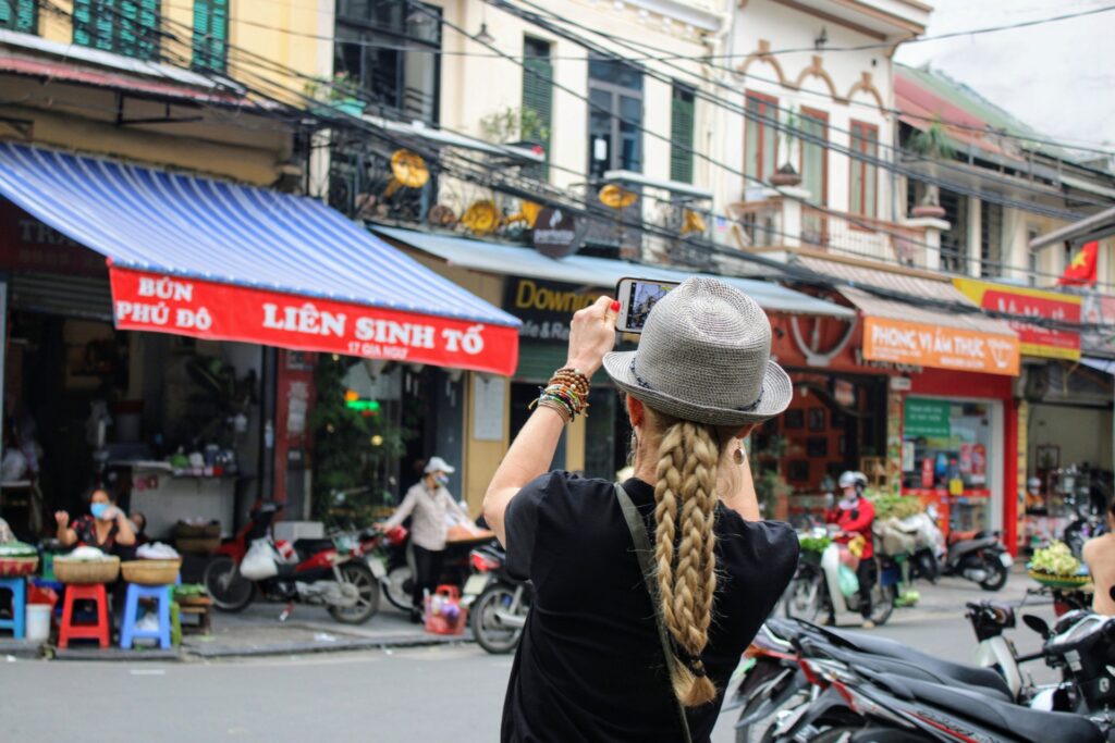 a person walking down a busy city street