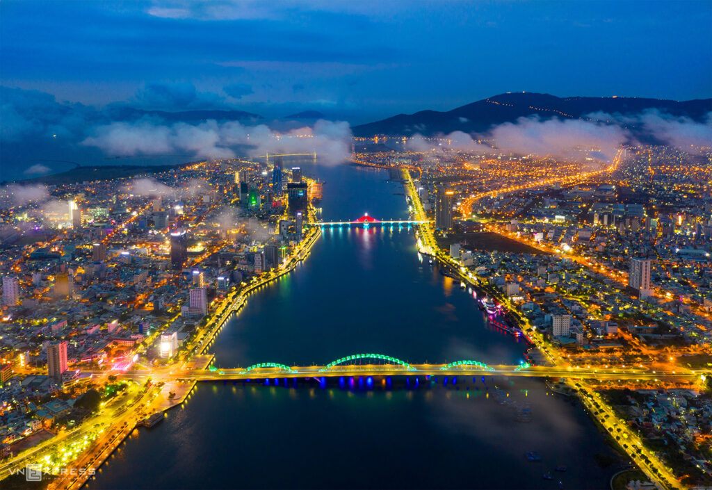 a view of a large body of water with a city in the background