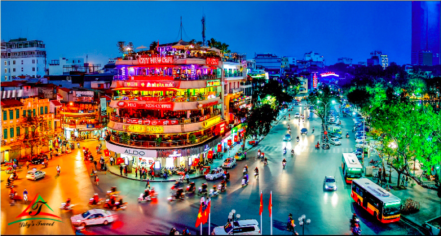 a view of a city street filled with traffic at night