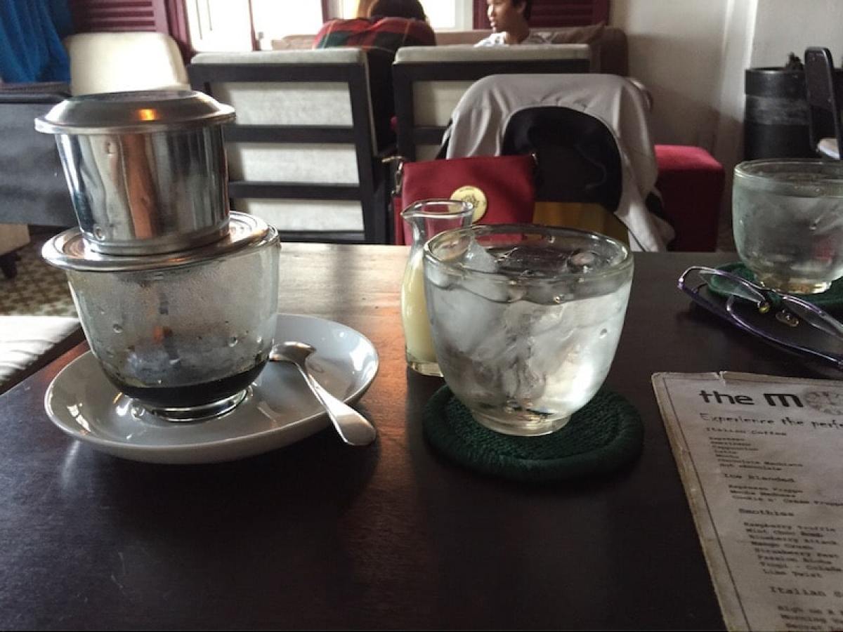 a cup of coffee on a table