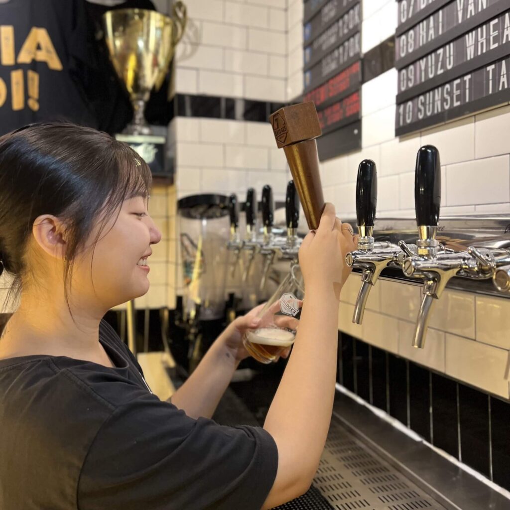 a woman drinking a glass of wine