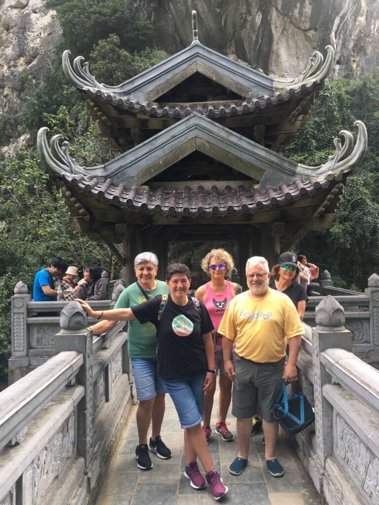 a group of people standing in front of a building